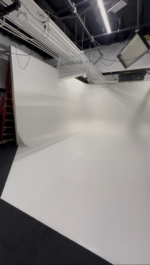 After covering the grey half and whiteboxing the room with 2 coats