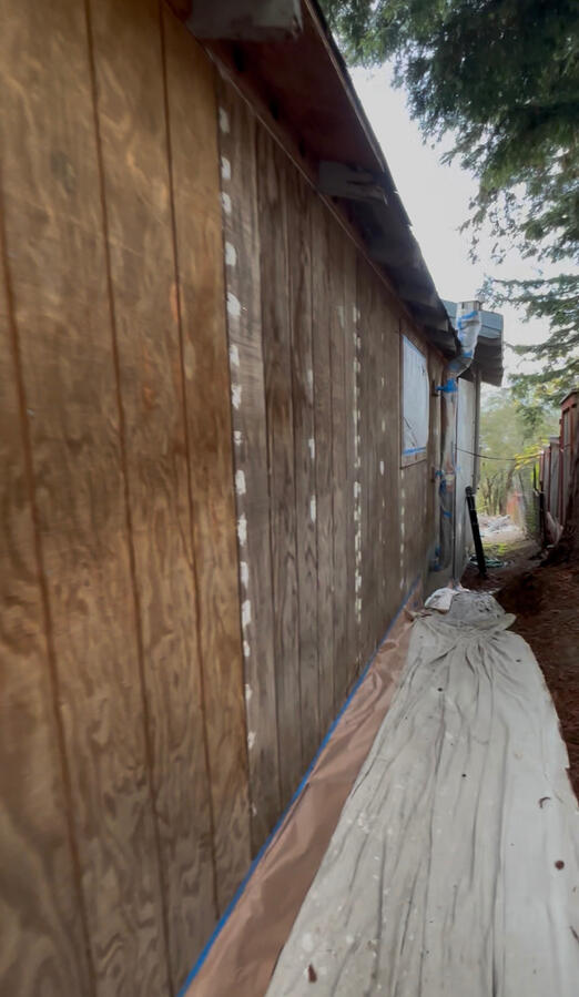 Bare recently replaced wood before paint